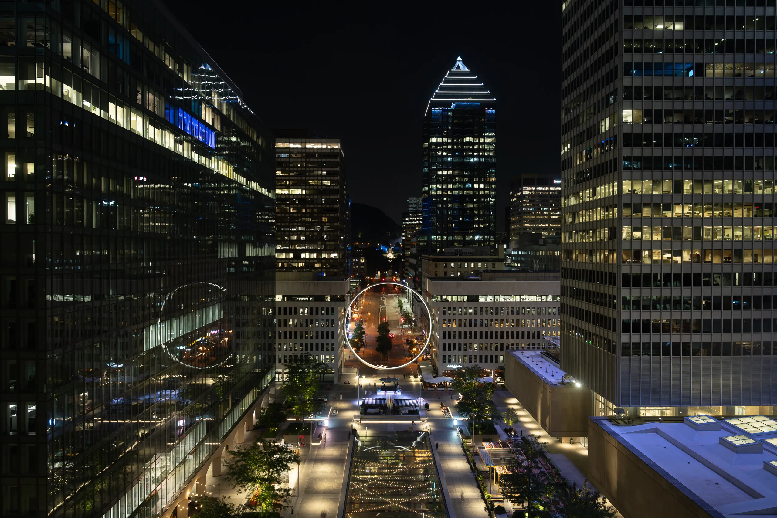 Night view of downtown Montreal from the Nacarat Terrace at Fairmont The Queen Elizabeth